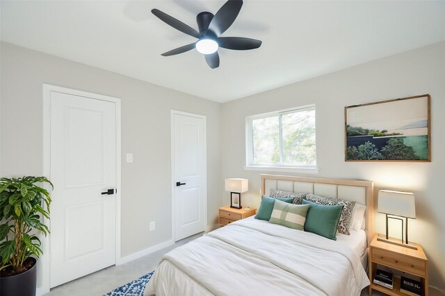 bedroom featuring baseboards and a ceiling fan