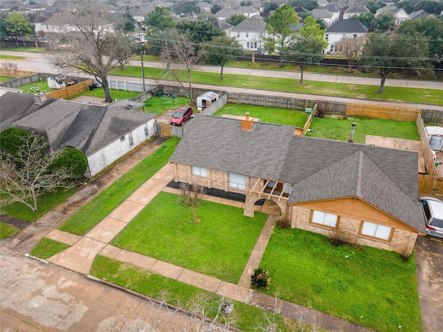 drone / aerial view with a residential view