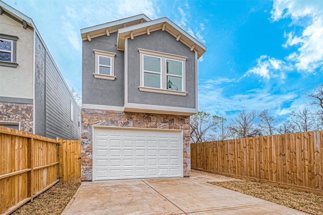 9418 Madera Rd, Houston, TX 77078 - garage with concrete driveway and fence