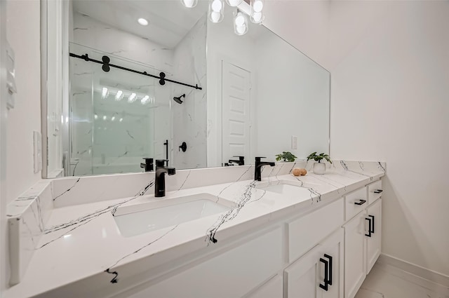 9418 Madera Rd, Houston, TX 77078 - bathroom with a marble finish shower, double vanity, and baseboards