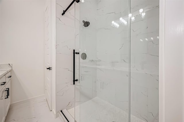 9418 Madera Rd, Houston, TX 77078 - full bath featuring a marble finish shower, vanity, marble finish floors, and baseboards