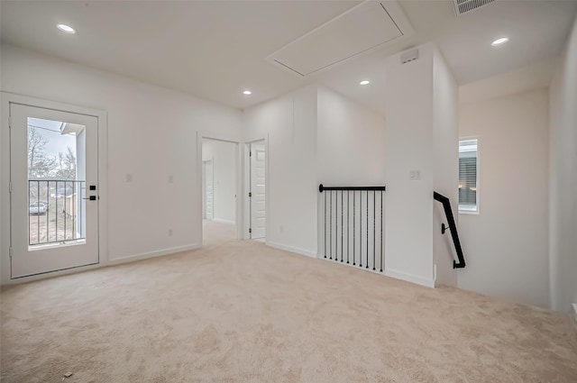 9418 Madera Rd, Houston, TX 77078 - carpeted empty room with attic access, recessed lighting, and baseboards