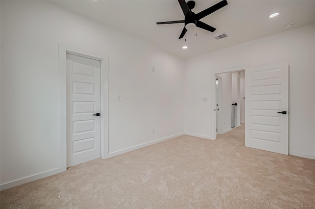 9418 Madera Rd, Houston, TX 77078 - unfurnished bedroom featuring light carpet, recessed lighting, baseboards, and a ceiling fan