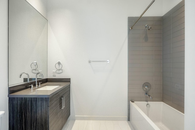 full bath with baseboards, vanity, and tub / shower combination