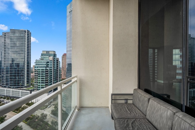 balcony featuring a view of city