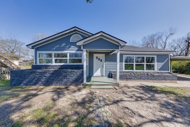 view of front of home with stone siding