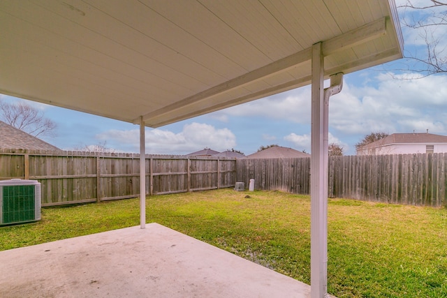 view of yard featuring central air condition unit, a patio area, and a fenced backyard