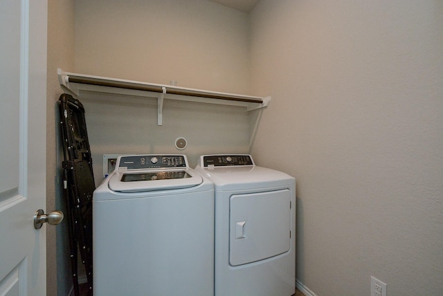 clothes washing area featuring laundry area and independent washer and dryer