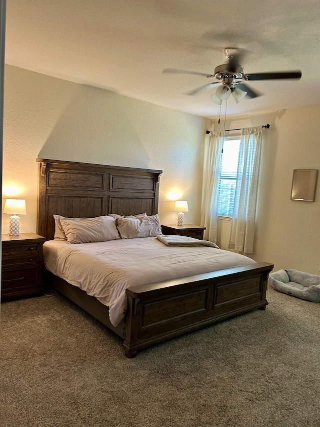 carpeted bedroom with ceiling fan