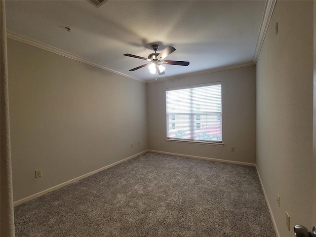 unfurnished room with carpet, ornamental molding, ceiling fan, and baseboards