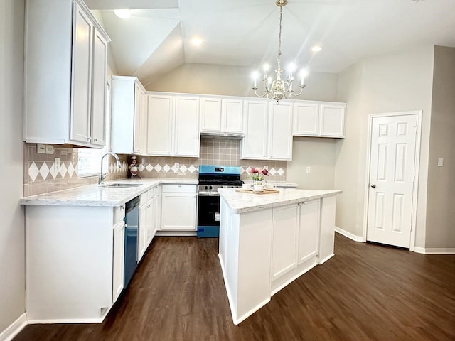 kitchen with a sink, white cabinetry, hanging light fixtures, appliances with stainless steel finishes, and a center island