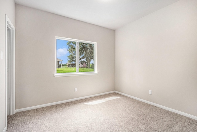 2102 Twin Lakes Blvd, West Columbia, TX 77486 - carpeted spare room with baseboards