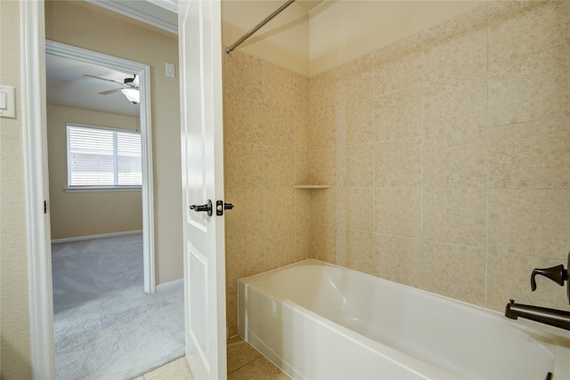 full bath with ceiling fan, shower / washtub combination, tile patterned flooring, and baseboards