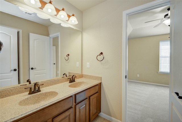 full bathroom with a ceiling fan, visible vents, a sink, and double vanity