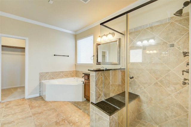 bathroom with a stall shower, a walk in closet, crown molding, vanity, and a bath