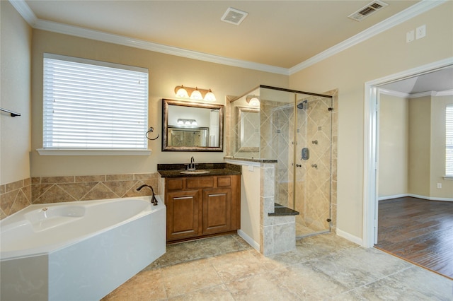 full bath with vanity, visible vents, and crown molding