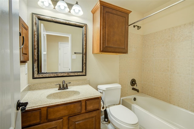 full bath featuring toilet, vanity, and bathing tub / shower combination