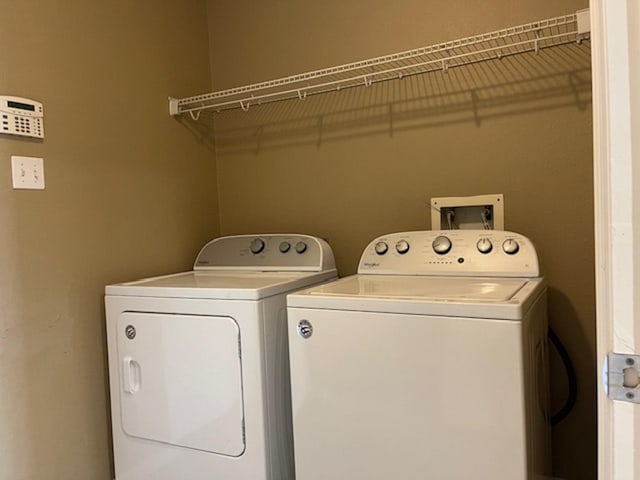 laundry room with washing machine and dryer and laundry area