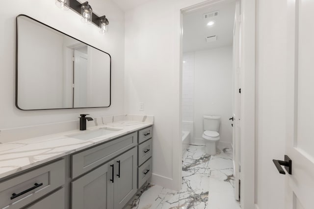 full bathroom featuring marble finish floor, visible vents, toilet, washtub / shower combination, and vanity