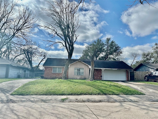 ranch-style house featuring concrete driveway, brick siding, a front yard, and fence