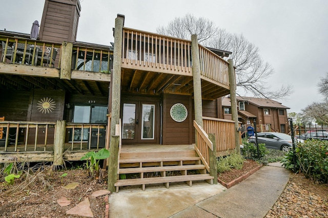 rear view of property with a chimney