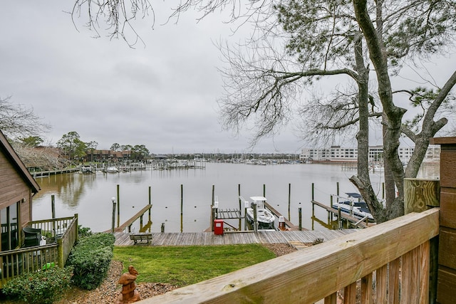 view of dock with a water view and boat lift