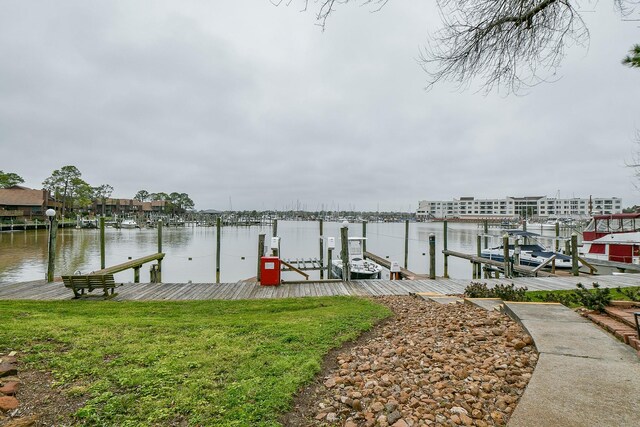 dock area featuring a water view and boat lift