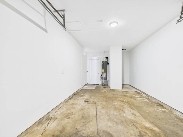 garage featuring water heater