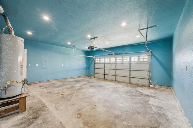 garage with a garage door opener, gas water heater, and electric panel