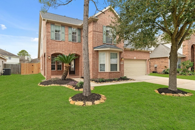 traditional-style house with brick siding, concrete driveway, central AC, fence, and a front lawn