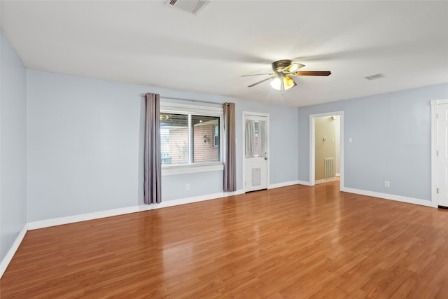 11707 Bowie Dr, La Porte, TX 77571 - unfurnished room featuring light wood finished floors, visible vents, and baseboards