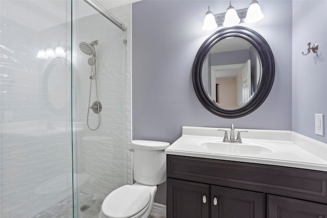 11707 Bowie Dr, La Porte, TX 77571 - bathroom featuring vanity, a shower stall, and toilet
