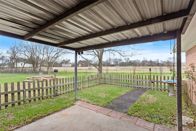 11707 Bowie Dr, La Porte, TX 77571 - view of yard with a patio area, a fenced backyard, and a rural view