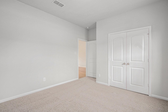 411 Wellshire Dr, West Columbia, TX 77486 - unfurnished bedroom with carpet floors and a closet