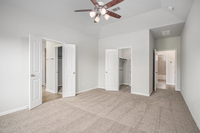411 Wellshire Dr, West Columbia, TX 77486 - unfurnished bedroom featuring a spacious closet, carpet floors, a closet, and ceiling fan