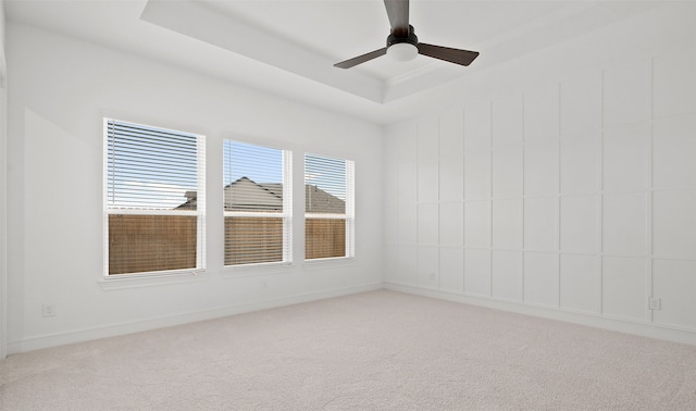 128 Luther Dean Ln, New Waverly, TX 77358 - unfurnished room with carpet floors, a raised ceiling, ceiling fan, and baseboards