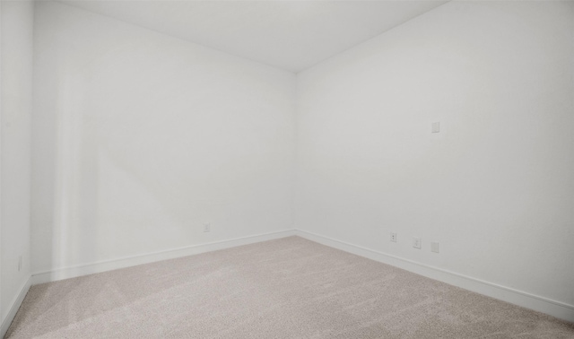 128 Luther Dean Ln, New Waverly, TX 77358 - unfurnished room featuring carpet flooring and baseboards