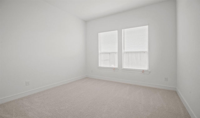 128 Luther Dean Ln, New Waverly, TX 77358 - spare room with light colored carpet and baseboards