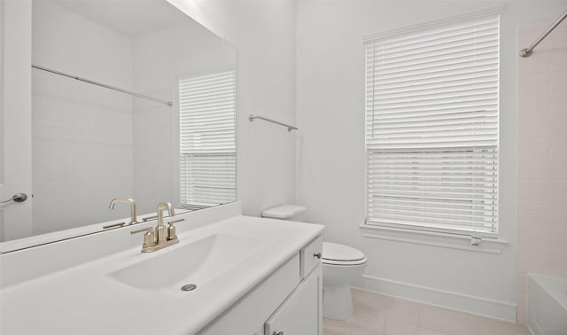 128 Luther Dean Ln, New Waverly, TX 77358 - full bath with tile patterned flooring, toilet, baseboards, and vanity