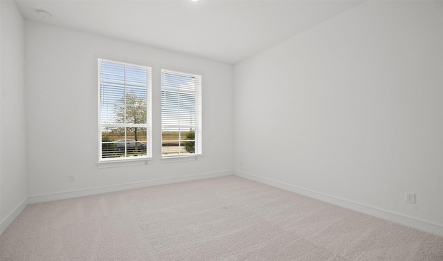 128 Luther Dean Ln, New Waverly, TX 77358 - unfurnished room featuring light carpet and baseboards