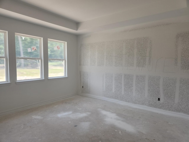 128 Luther Dean Ln, New Waverly, TX 77358 - spare room with unfinished concrete flooring and baseboards