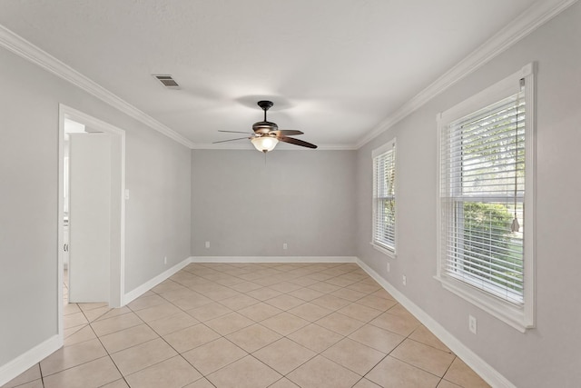 unfurnished room featuring visible vents, baseboards, ceiling fan, ornamental molding, and light tile patterned flooring