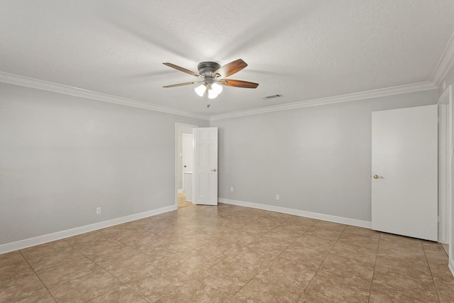 unfurnished room with ceiling fan, a textured ceiling, visible vents, baseboards, and ornamental molding