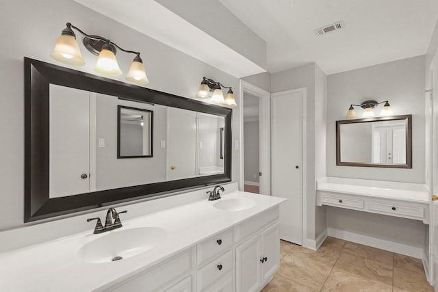 full bath featuring double vanity, baseboards, visible vents, and a sink