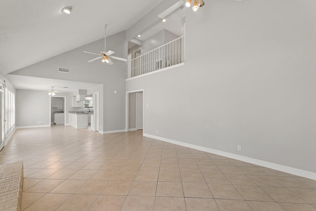 unfurnished living room featuring baseboards, visible vents, a ceiling fan, and light tile patterned flooring