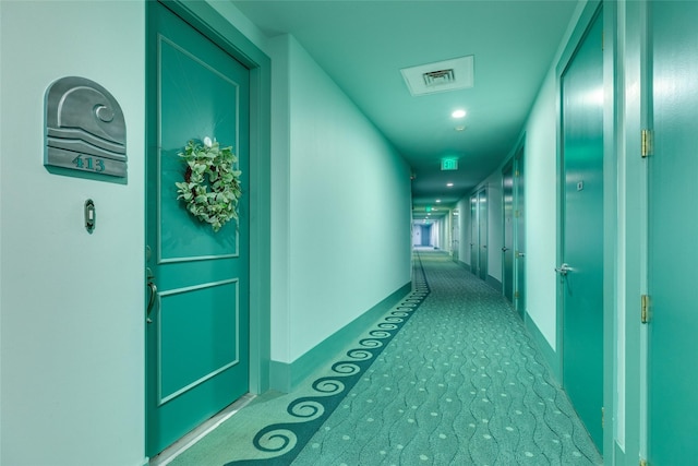 hallway featuring visible vents