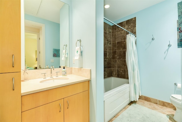 full bathroom featuring shower / bath combination with curtain, vanity, toilet, and tile patterned floors