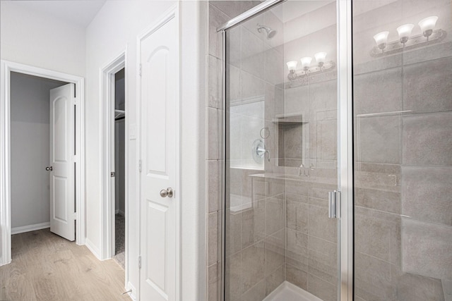 314 Wellshire Dr, West Columbia, TX 77486 - full bath featuring a stall shower and wood finished floors