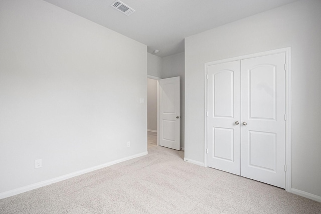 314 Wellshire Dr, West Columbia, TX 77486 - unfurnished bedroom with light colored carpet and a closet