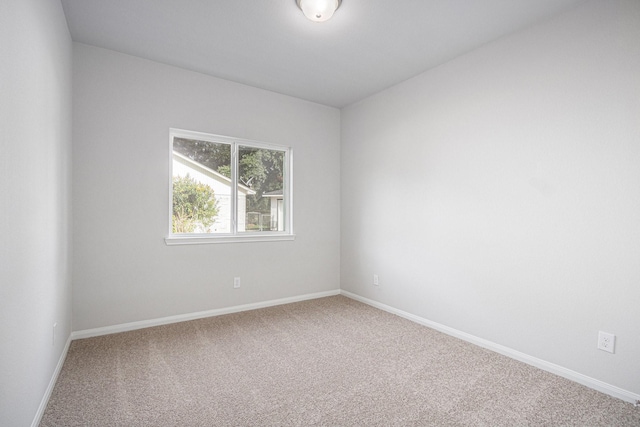314 Wellshire Dr, West Columbia, TX 77486 - carpeted spare room featuring baseboards